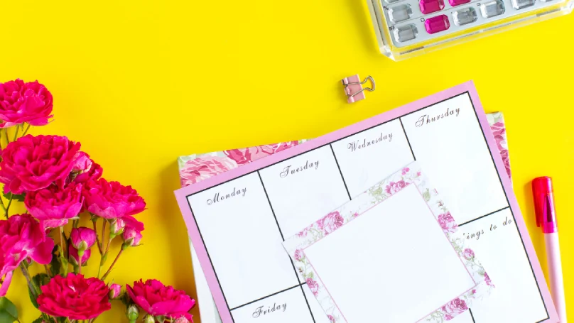 A colorful calendar with sticky notes and highlighted dates.