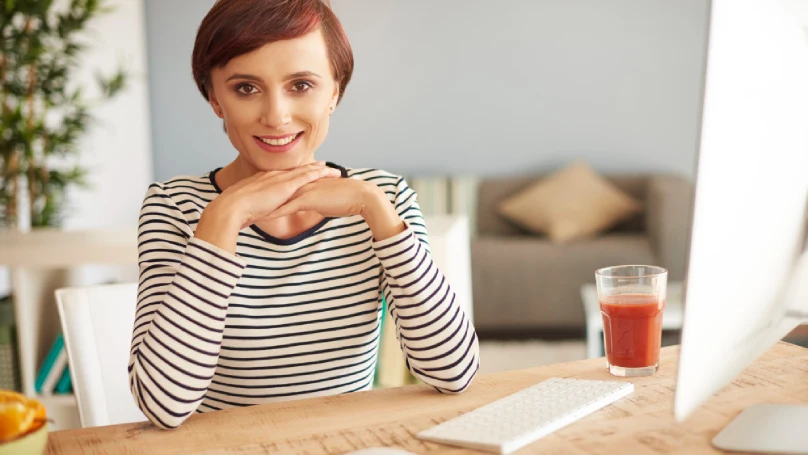 A social worker sitting at a desk