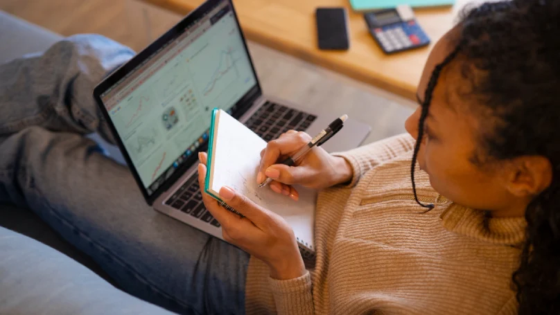 A student using a laptop with productivity apps open.