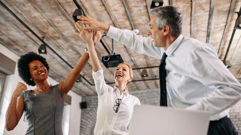 A group of people celebrating success